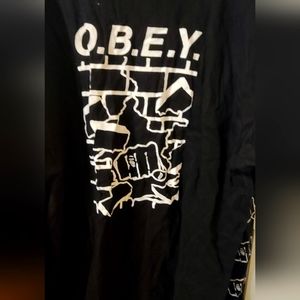XL OBEY FACE IN FIST LS TEE